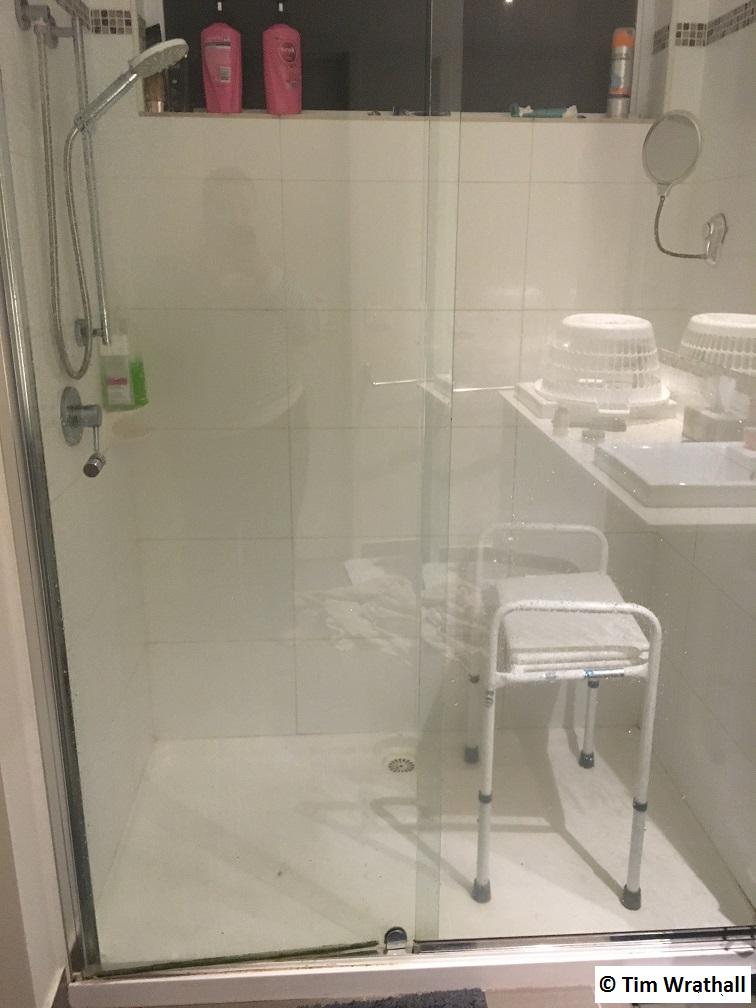 My Shower whilst I was in a Leg brace. The washing basket helped with leg elevation.