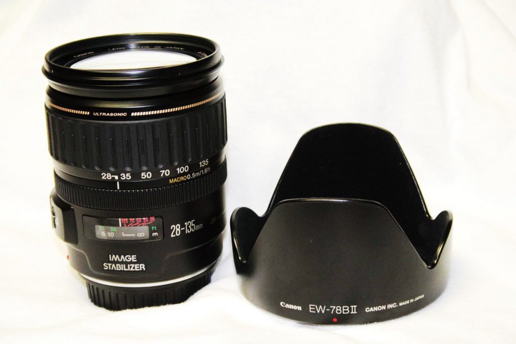 The Canon EF 28-135mm IS UISM, with Lens hood. A must have accessory, if you want to shoot on sunny days.